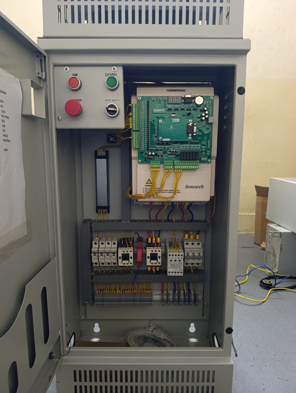 A professionally assembled elevator control panel designed for reliable operation, organized electrical wiring, and efficient elevator performance. Installed and configured by Islamabad Elevator Solutions.